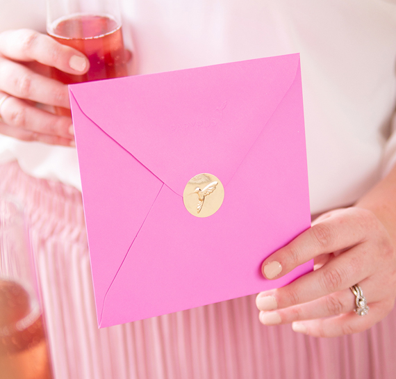 Woman holding Papyrus card