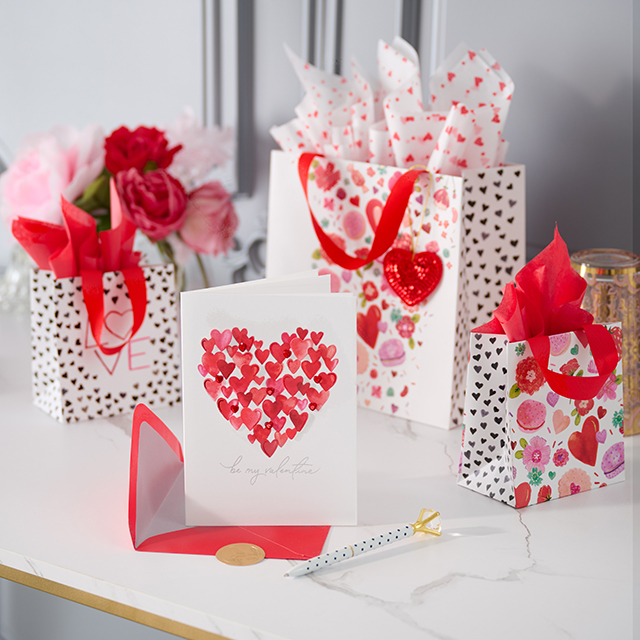 Valentine's Day Heart Card and Gift Bags on counter